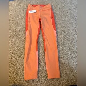 Outdoor Voices Coral and Orange Colorblock Leggings